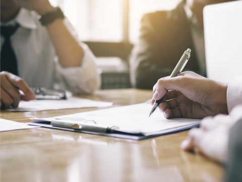 Business people reviewing paperwork