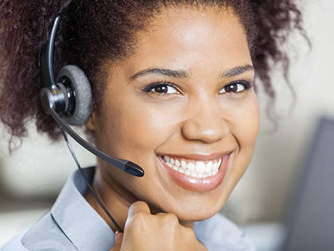 Close up of female customer service representative wearing headset