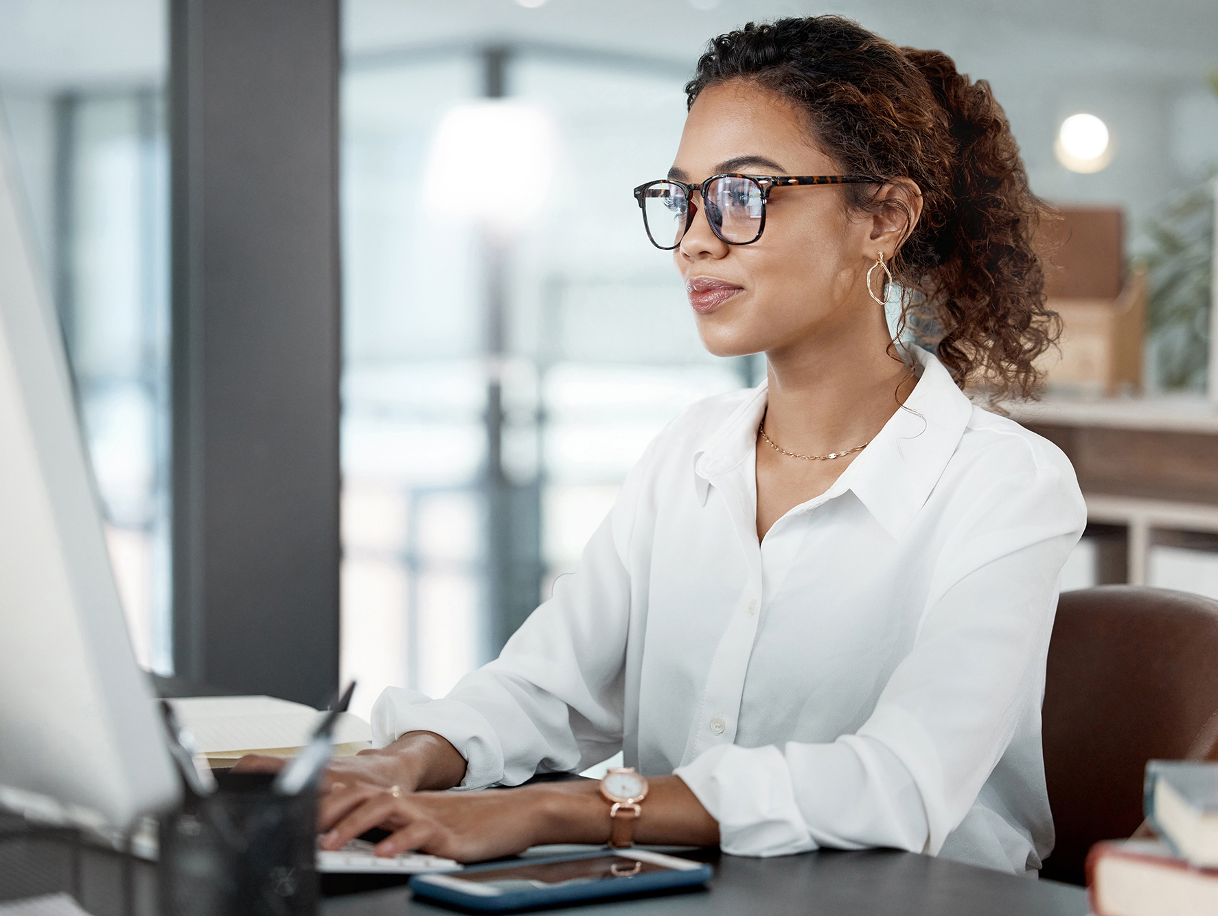 Young woman working at computer